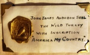 Impression on gold wax of John James Audubon's seal